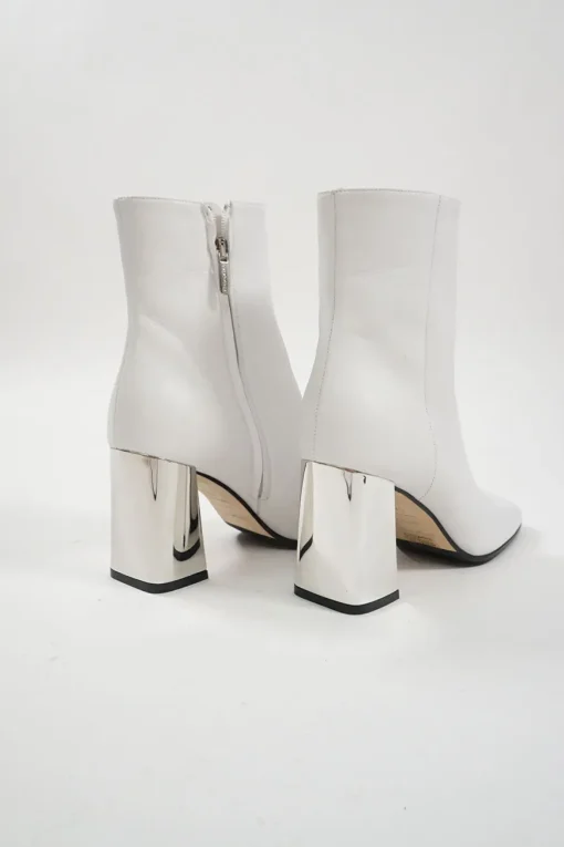 White leather square-toe zip-up ankle booties with mirrored block heel