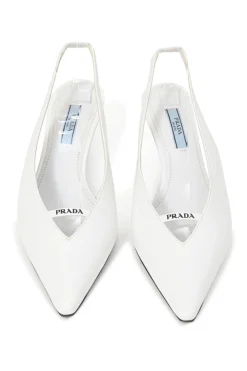 White leather V-neck slingback court pumps