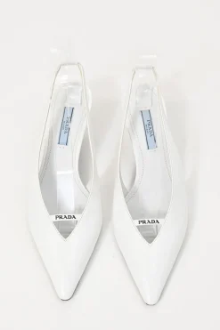 White leather V-neck slingback court pumps