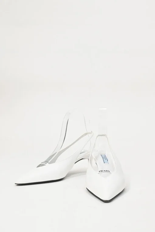 White leather V-neck slingback court pumps