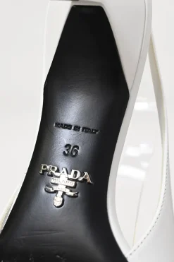 White leather V-neck slingback court pumps