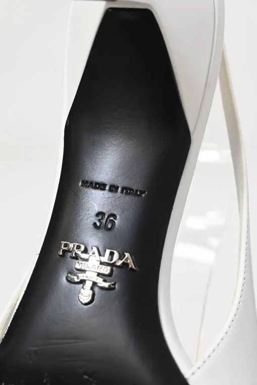 White leather V-neck slingback court pumps