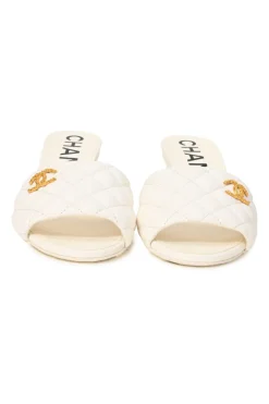 White matelassé goatskin leather and rubber cone heel slide sandals with gold-finish Coco Mark vamp appliqué