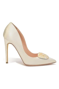 White polished calfskin pointed-toe pumps featuring gold-foiled pebble vamp appliqué