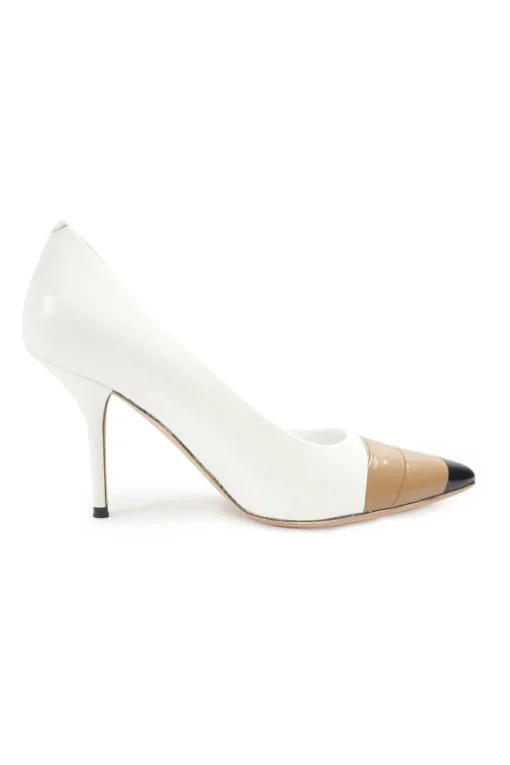 White polished calfskin pointed toe pumps with contrast bandage-style cap toe