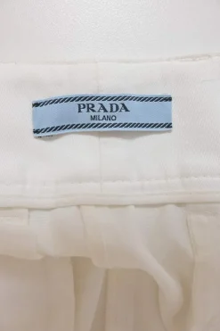 White pull-on mid-rise wide-leg trousers with turn-up cuffs