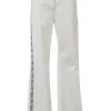 White raw-edge cotton-blend denim high-rise wide-leg jeans with floral-embroidered side seam