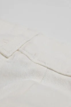 White raw-edge cotton-blend denim high-rise wide-leg jeans with floral-embroidered side seam