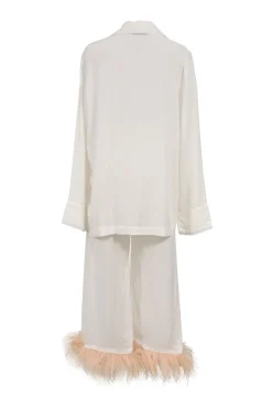 White viscose pyjama two-piece set featuring notch collar blouse and wide-leg lounge pants with detachable feather trim appliqué