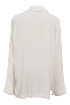 White viscose pyjama two-piece set featuring notch collar blouse and wide-leg lounge pants with detachable feather trim appliqué