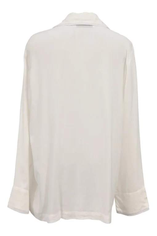 White viscose pyjama two-piece set featuring notch collar blouse and wide-leg lounge pants with detachable feather trim appliqué