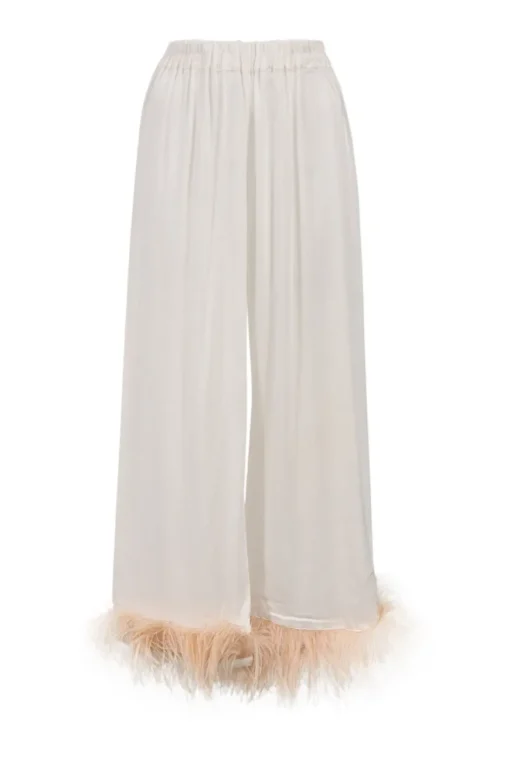 White viscose pyjama two-piece set featuring notch collar blouse and wide-leg lounge pants with detachable feather trim appliqué