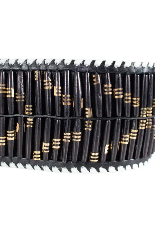 Wide belt in black with white leather weaving on edges and black wooden baguette beads with gold embellishment and gold buckle