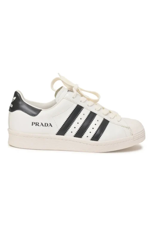 x Adidas white leather Superstar low-top sneakers