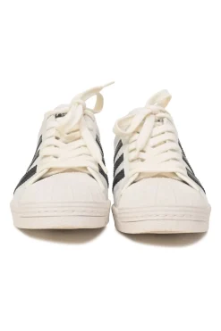 x Adidas white leather Superstar low-top sneakers