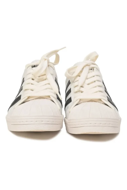 x Adidas white leather Superstar low-top sneakers