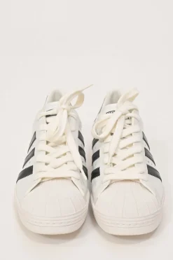 x Adidas white leather Superstar low-top sneakers