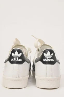 x Adidas white leather Superstar low-top sneakers