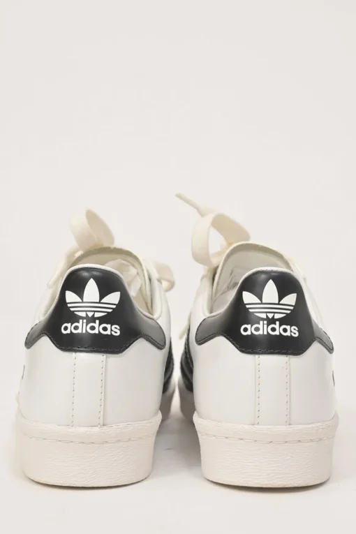 x Adidas white leather Superstar low-top sneakers