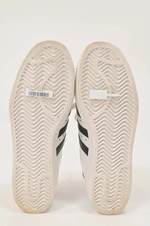x Adidas white leather Superstar low-top sneakers