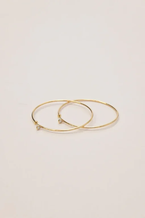 x Elsa Peretti 18-karat yellow gold and .10 CTTW round cut diamond hoop earrings