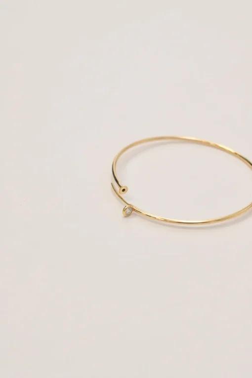x Elsa Peretti 18-karat yellow gold and .10 CTTW round cut diamond hoop earrings