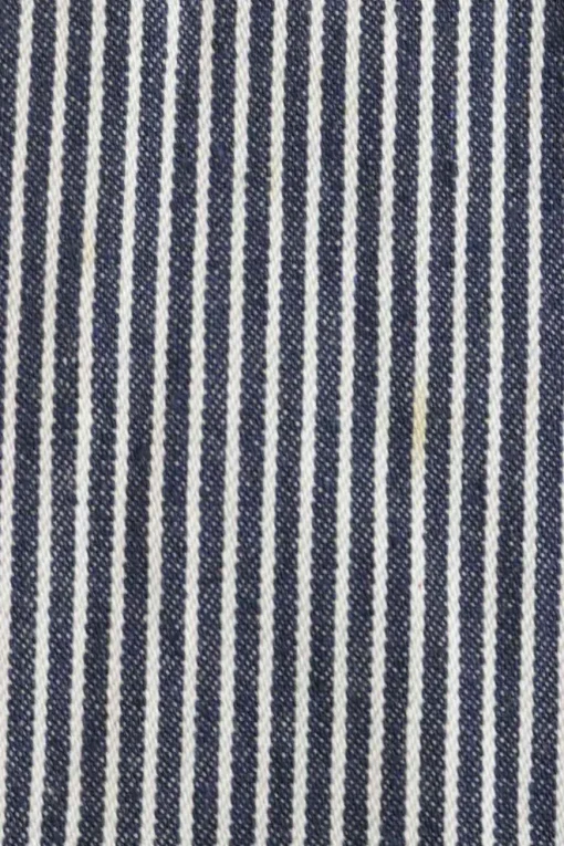 x Mr. Men Mr. Happy embroidered striped indigo cotton-blend denim button-front jumpsuit