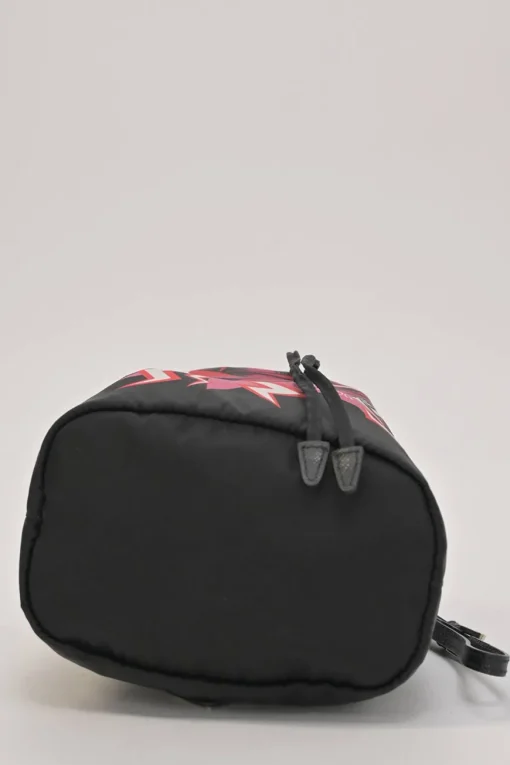 x Universal Studios black printed ripstop nylon and leather Tessuto stampata rose print bucket wristlet bag