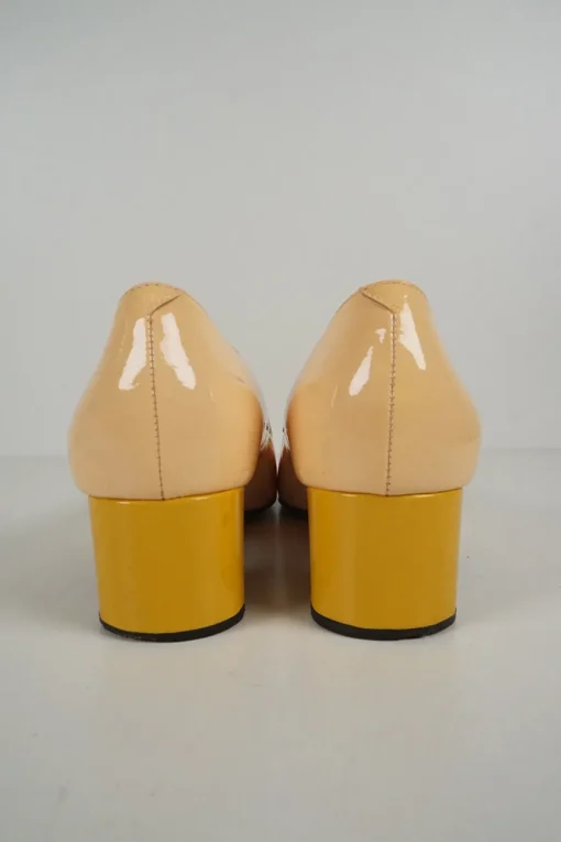 Yellow and cream patent leather U-LOOK square-toe court buckle pumps
