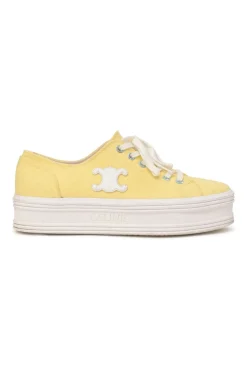 Yellow canvas and leather Jane low-top flatform sneakers featuring signature Triomphe quarter appliqué