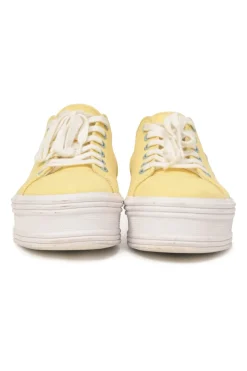 Yellow canvas and leather Jane low-top flatform sneakers featuring signature Triomphe quarter appliqué