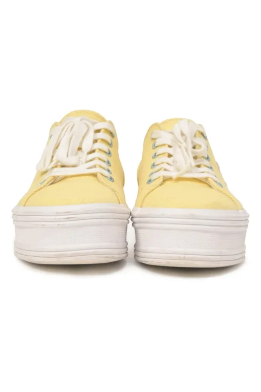 Yellow canvas and leather Jane low-top flatform sneakers featuring signature Triomphe quarter appliqué