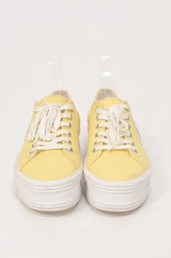 Yellow canvas and leather Jane low-top flatform sneakers featuring signature Triomphe quarter appliqué