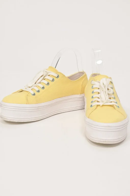 Yellow canvas and leather Jane low-top flatform sneakers featuring signature Triomphe quarter appliqué