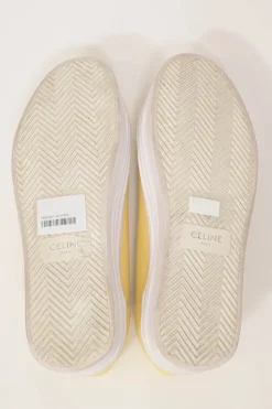 Yellow canvas and leather Jane low-top flatform sneakers featuring signature Triomphe quarter appliqué