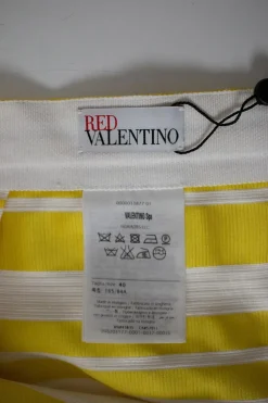 Yellow flounce skirt with white stripe