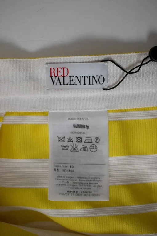 Yellow flounce skirt with white stripe