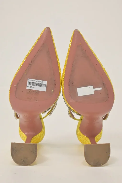 Yellow glitter-bonded leather and strass pointed-toe Gilda Mules with signature sculpted comma heels