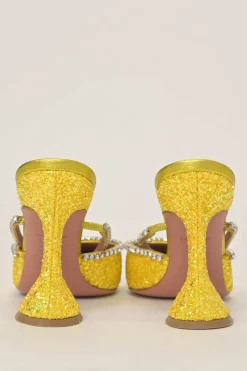 Yellow glitter-bonded leather and strass pointed-toe Gilda Mules with signature sculpted comma heels