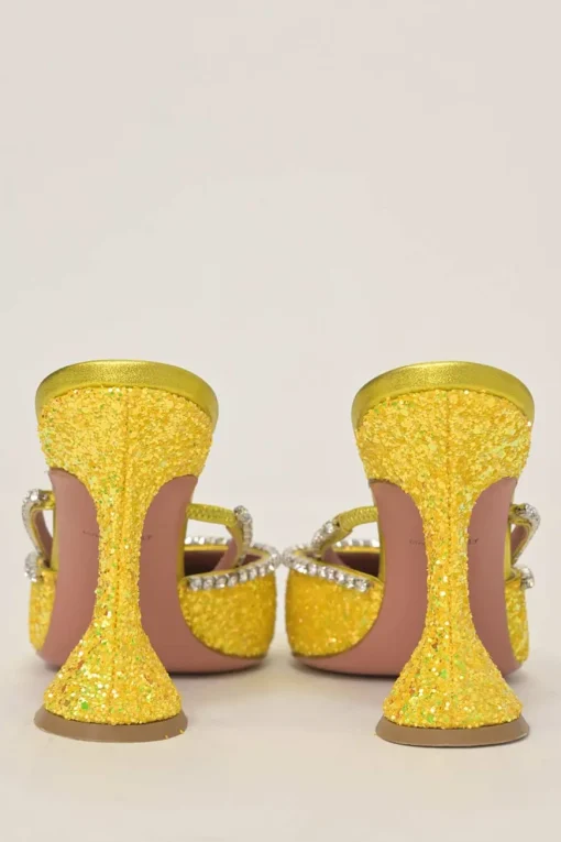 Yellow glitter-bonded leather and strass pointed-toe Gilda Mules with signature sculpted comma heels
