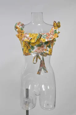 Yellow linen Poppy print two-piece set featuring off-shoulder ruffle bustier top and belted wide-leg pants
