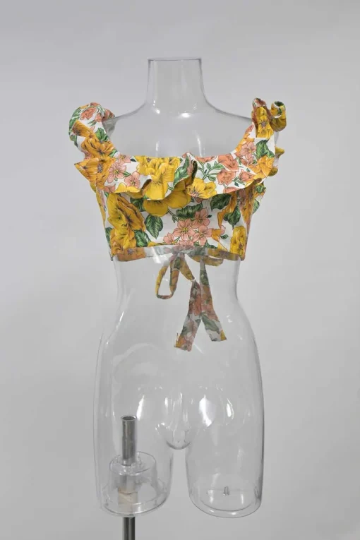 Yellow linen Poppy print two-piece set featuring off-shoulder ruffle bustier top and belted wide-leg pants