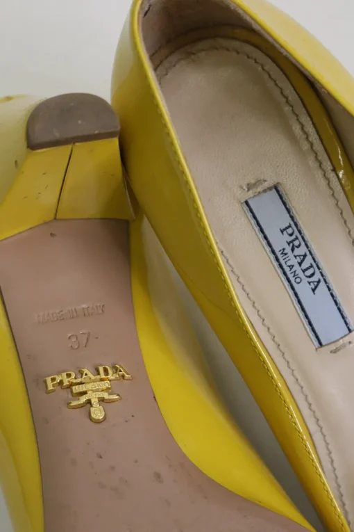 Yellow patent leather square-toe crystal-embellished buckle court shoes