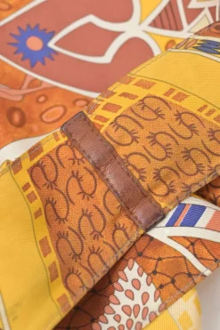 Yellow silk and leather paneled Petit H Sac featuring 'Le Mors a la Conetable' motif