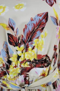 Beige long sleeve tropical floral print silk knee length flare dress.
