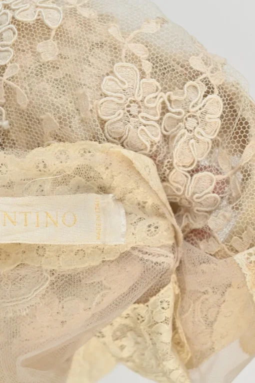 Beige semi-sheer scalloped floral lace wrap-effect button-loop peek-a-boo camisole