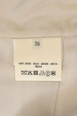 Beige silk ‘Brides de Gala en Désordre’ wrap mini skirt featuring original artwork by Hugo Grygkar and Cyrille Diatkine