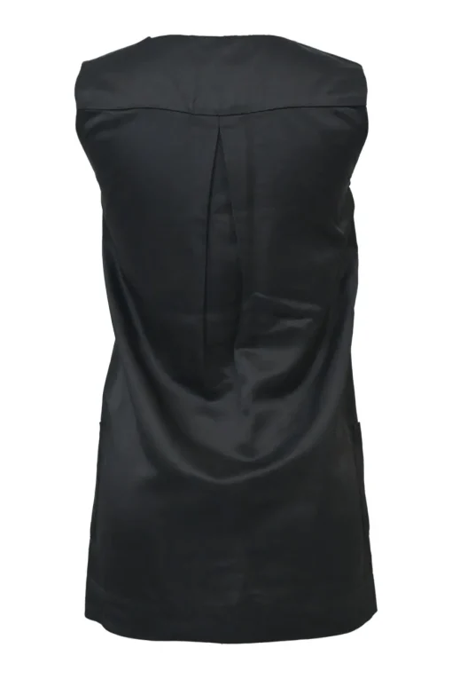 Black acetate sleeveless tunic top with button closure along shoulder
