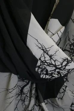 Black and charcoal digi-print polyester pullover draped sleeveless tunic top