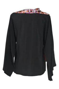 Black and fuchsia silk bateau neck dolman sleeve blouse with abstract kaleido print foulard fastening at shoulder